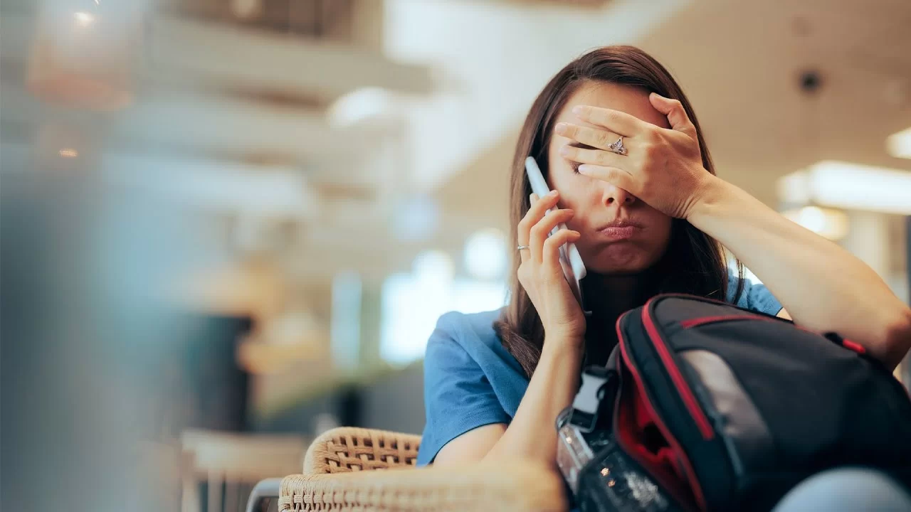 Woman on phone in airport