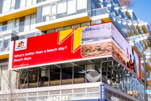 billboard on building showing Maryland tourism marketing 