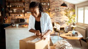 women unboxing a package