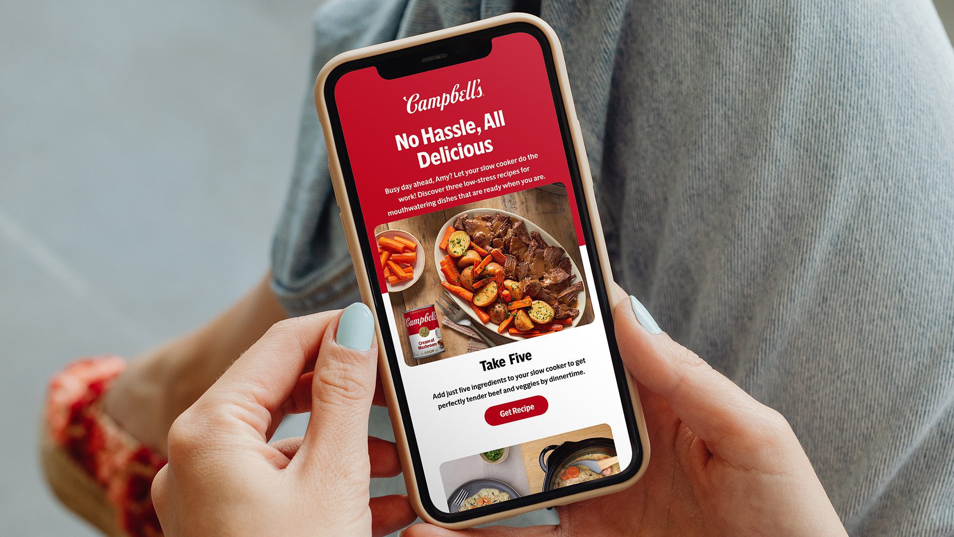 Person viewing a personalized Campbell’s recipe email on a smartphone